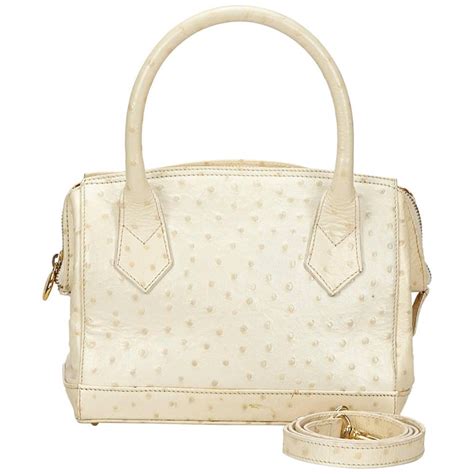 vintage fendi white embossed leather bag|baguette bag Fendi.